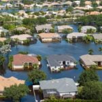 Flooded houses from hurricane Debby rainfall water in Laurel Meadows community in Sarasota, Florida. Aftermath of natural disaster in USA south