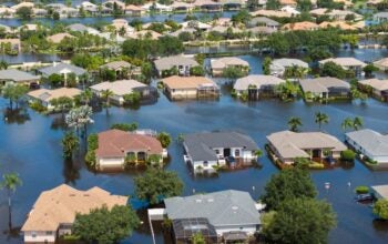 Flooded houses from hurricane Debby rainfall water in Laurel Meadows community in Sarasota, Florida. Aftermath of natural disaster in USA south
