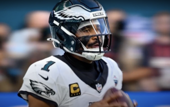 Jalen Hurts of the Philadelphia Eagles playing football in his uniform