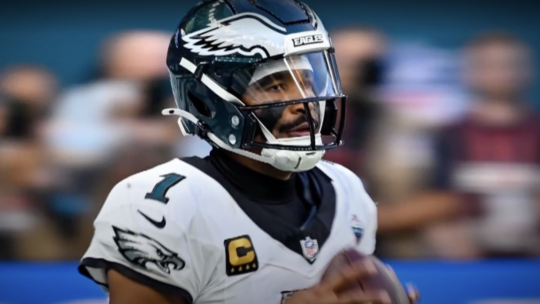 Jalen Hurts of the Philadelphia Eagles playing football in his uniform
