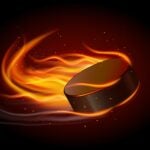 Realistic ice hockey puck in fire on black background